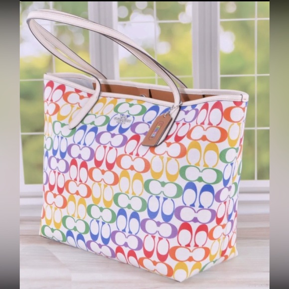 Multi-color coach shoulder handbag.Big enough to carry all important items. - Picture 2 of 2